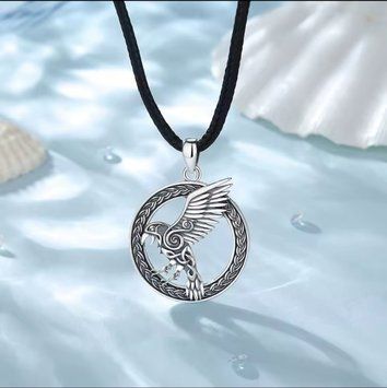 Silver amulet "Raven Power"